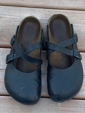 Birki’s by Birkenstock Black leather slide on clogs Cork Footbed size 38 7 worn